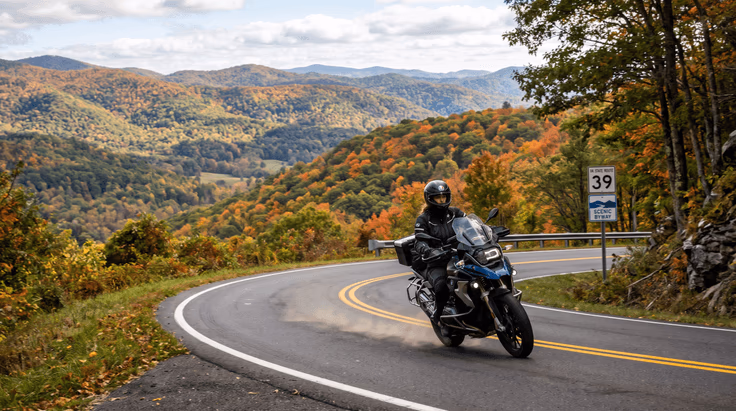 Motorcyclist riding scenic Virginia road with Class M license endorsement