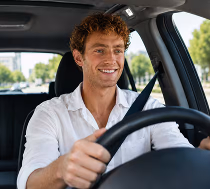 Happy driver after passing the DMV test