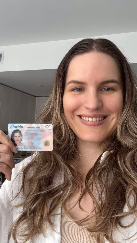 Driver holding their new license